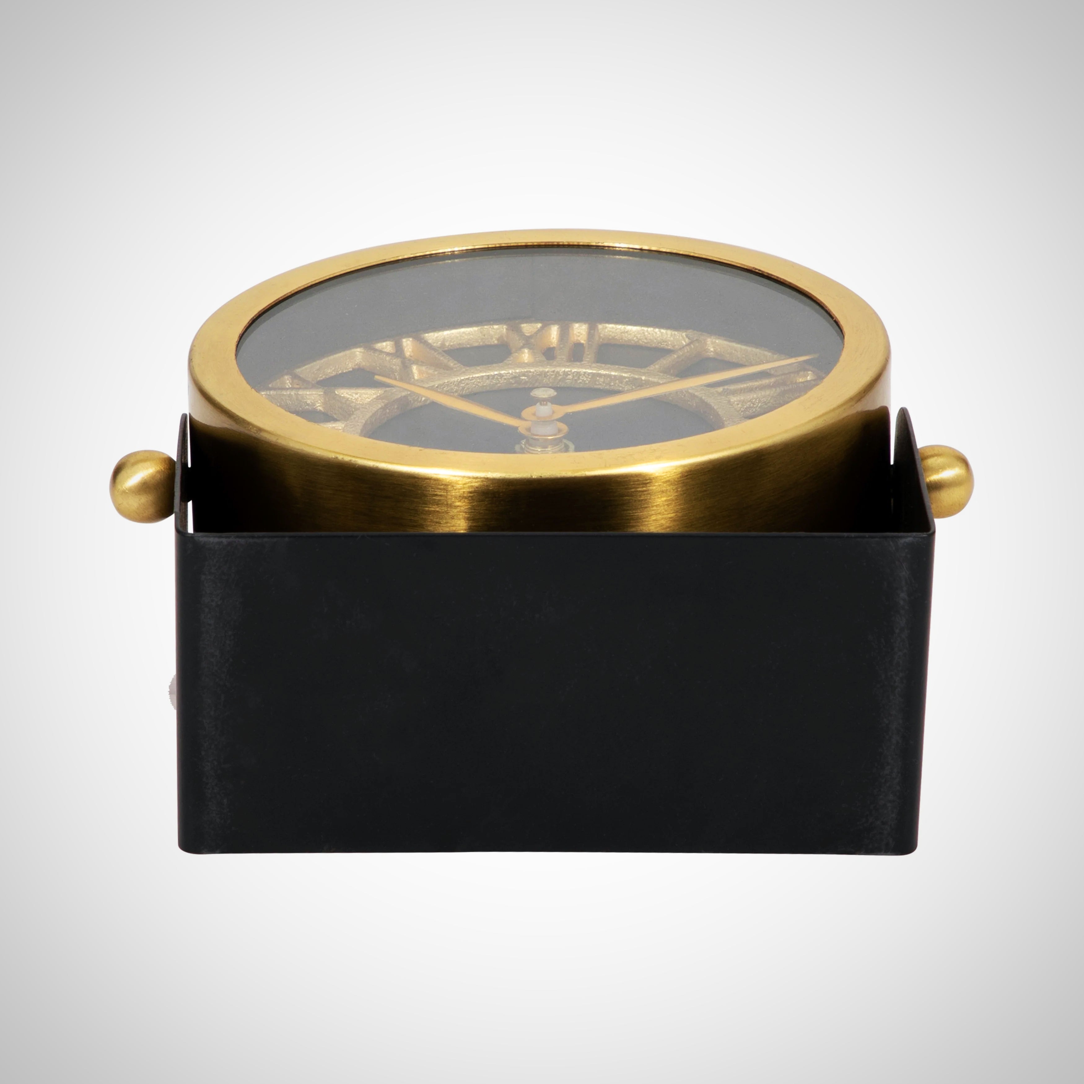 Reloj de mesa de metal dorado